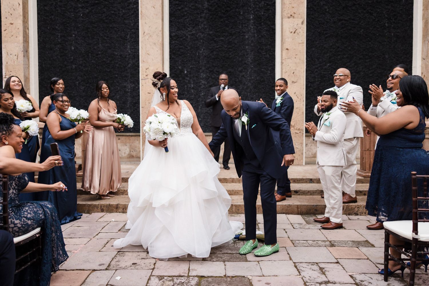 Jumping the broom at a Bell Tower on 34th wedding, Houston