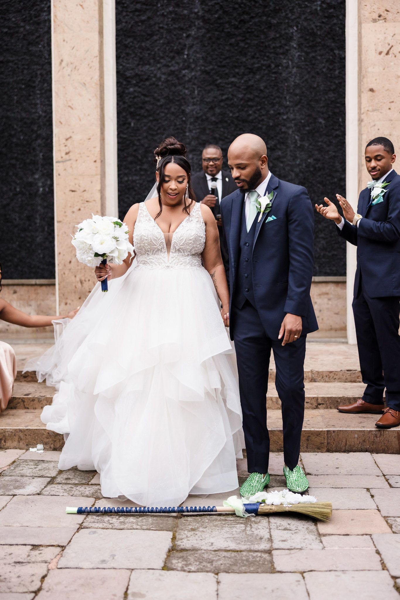 Jumping the broom at a Bell Tower on 34th wedding, Houston