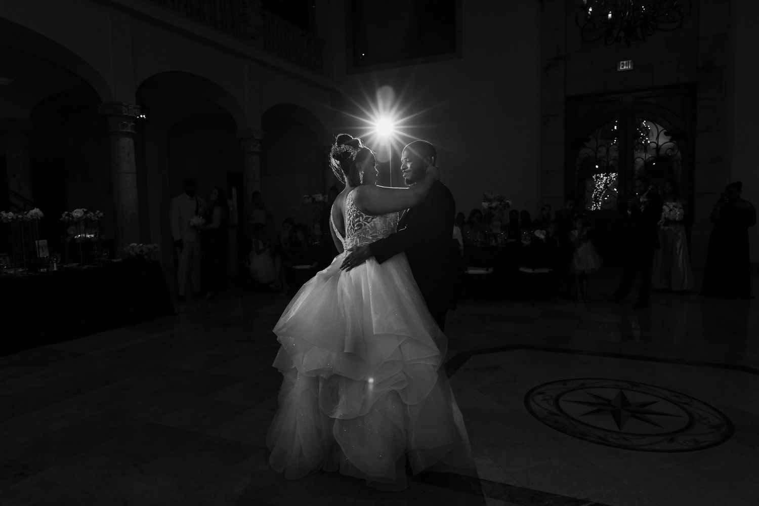 First dance under chandelier at Houston wedding