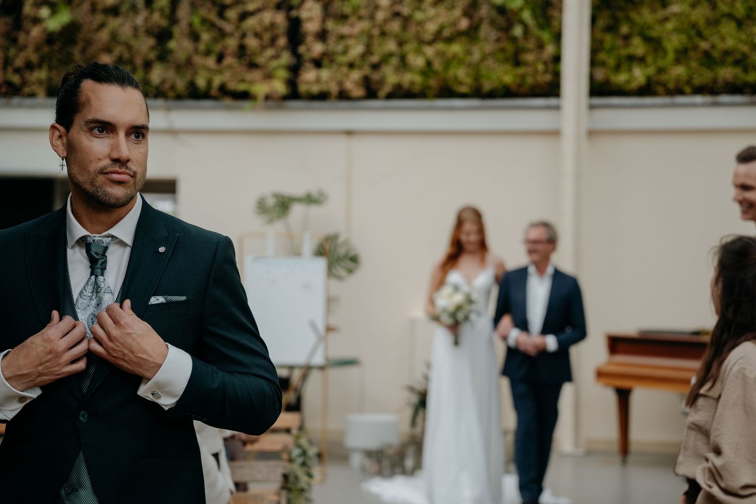 Wedding venue setup with elegant decor and natural lighting.