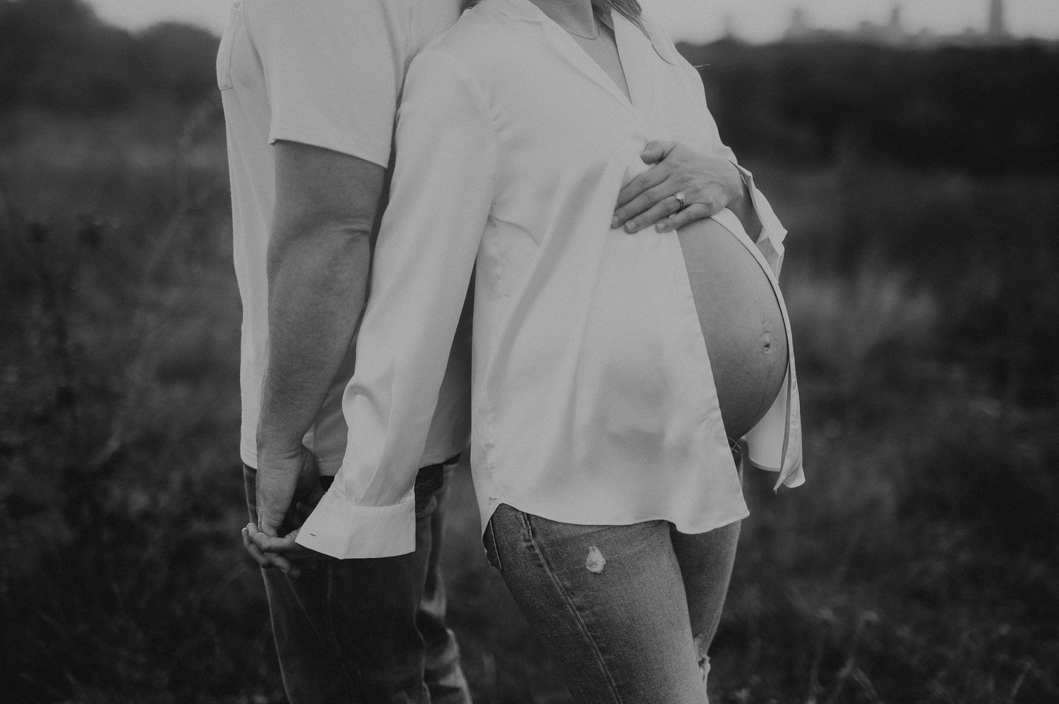 Black and white image of a maternity session near downtown Fort Worth