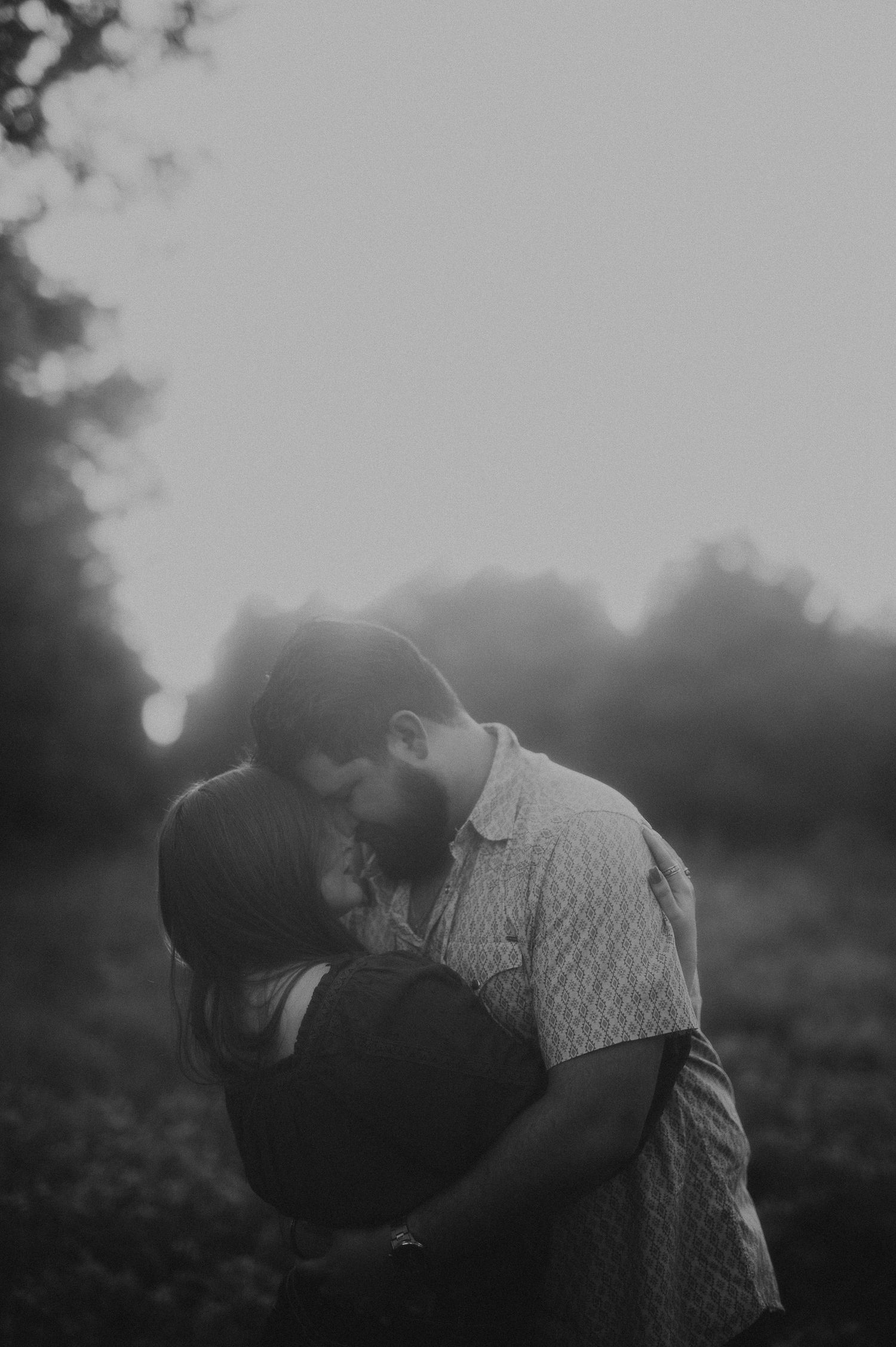 Engagement couple in a field in Fort Worth