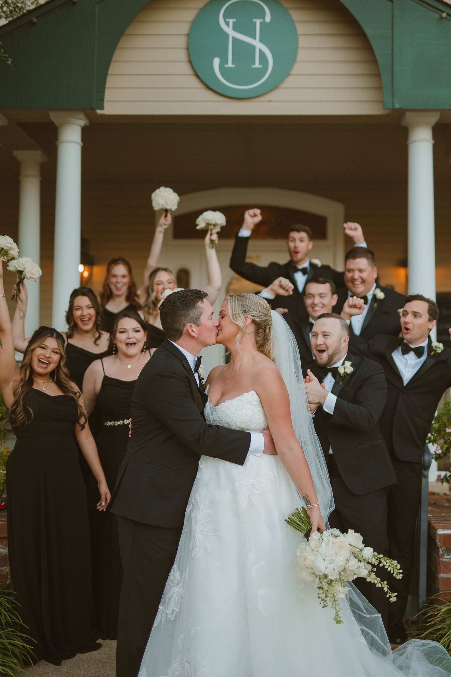 Wedding photo celebrating after wedding in Fort Worth, Tx at the Sanford House
