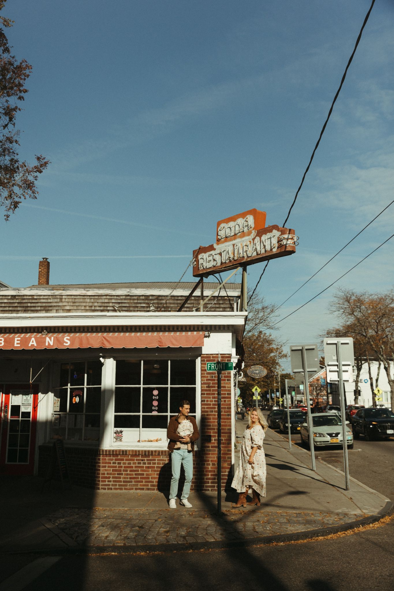 Vintage-style diner exterior with retro signage against blue sky.