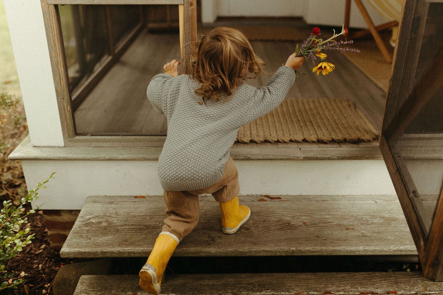 Artistic shots of yellow boots and casual attire on a wooden porch.