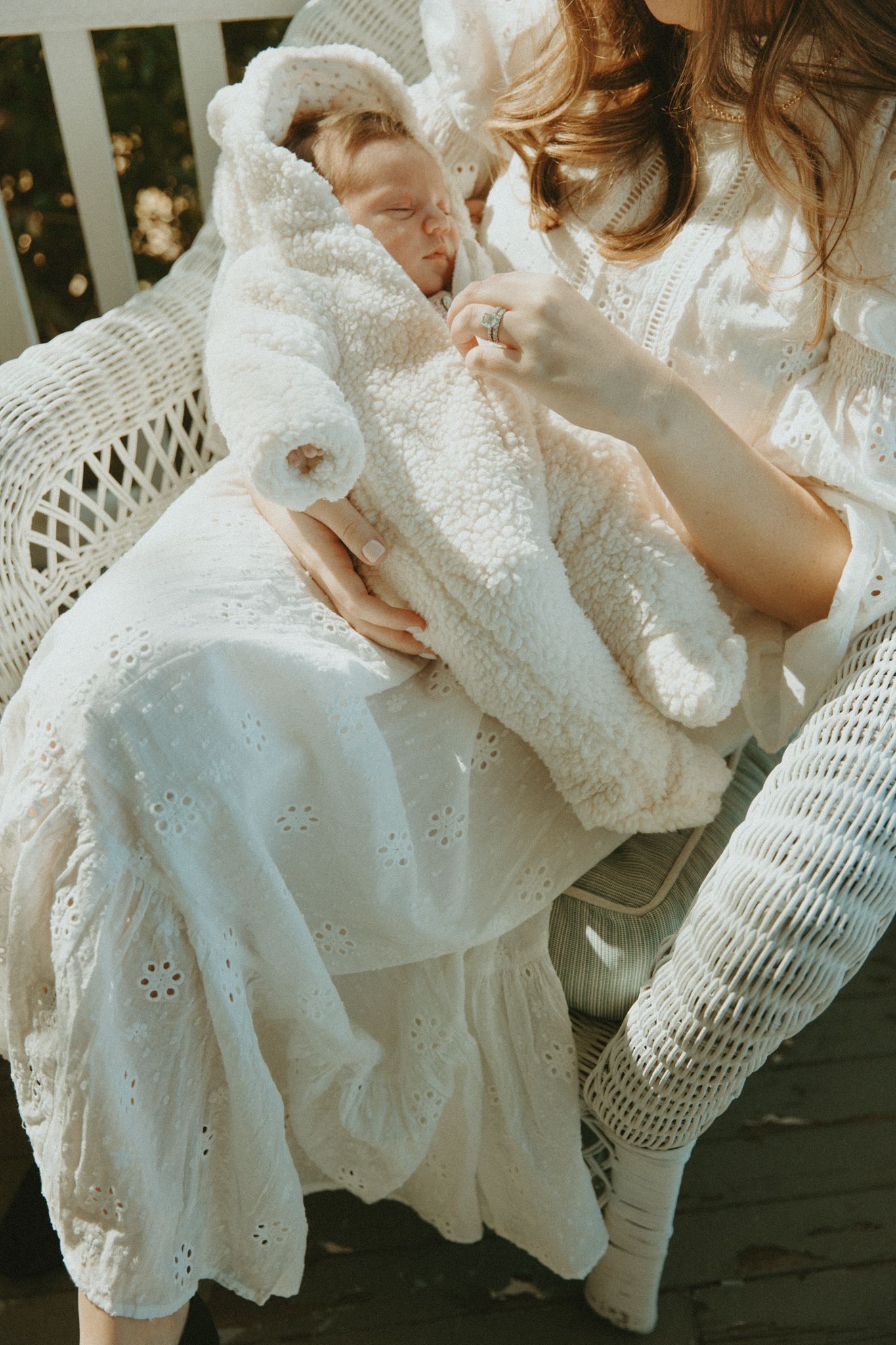 A series of photos featuring delicate white lace dresses and crochet details in soft lighting.