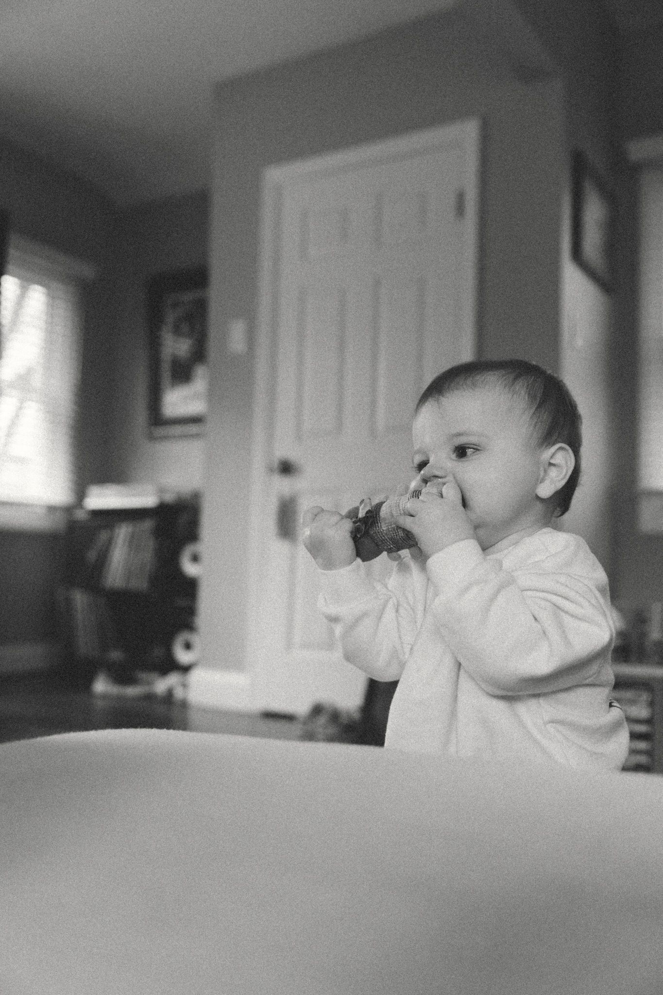 A sequence of black and white photos showing side profile views in an interior setting.