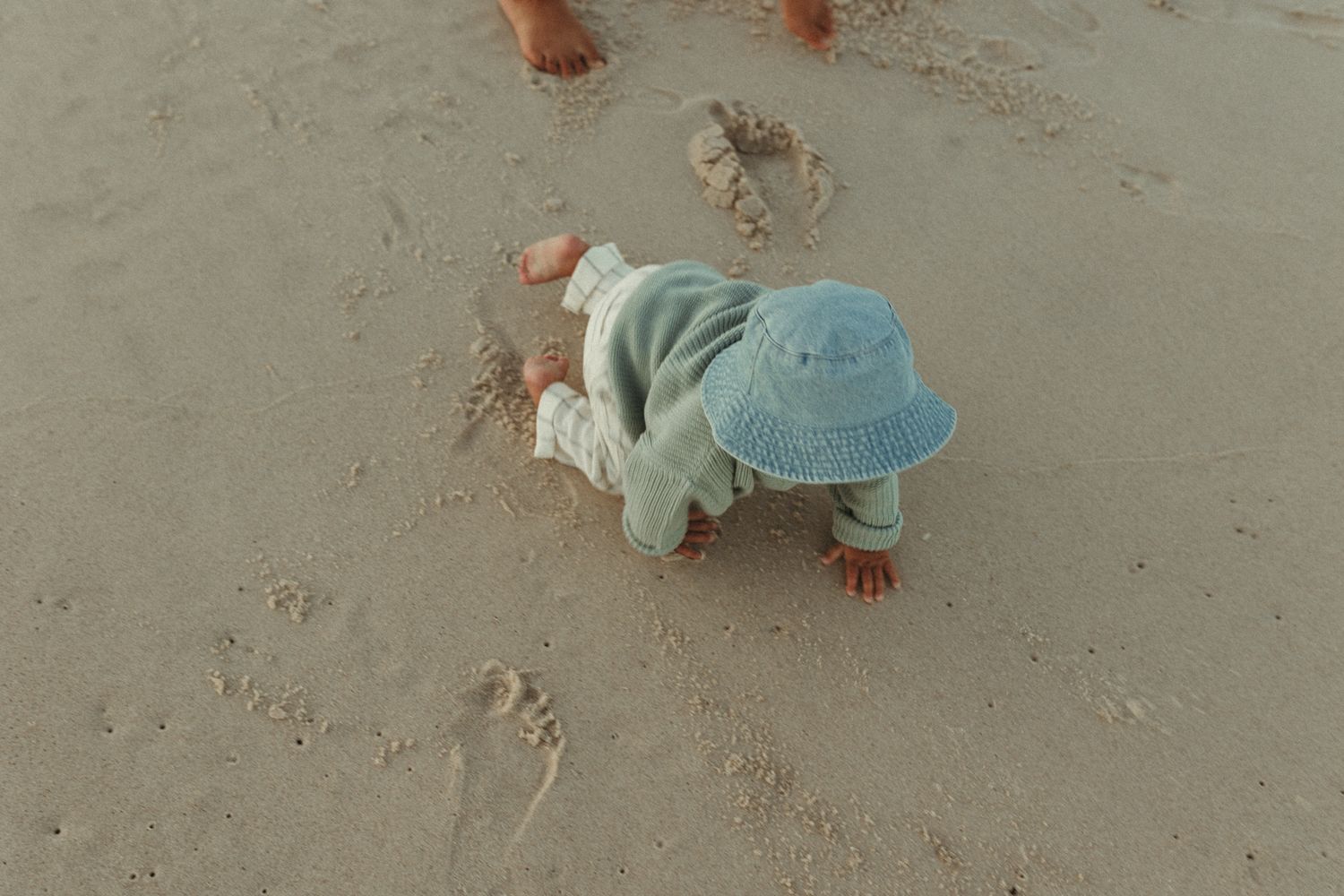Footprints and beach exploration at low tide.