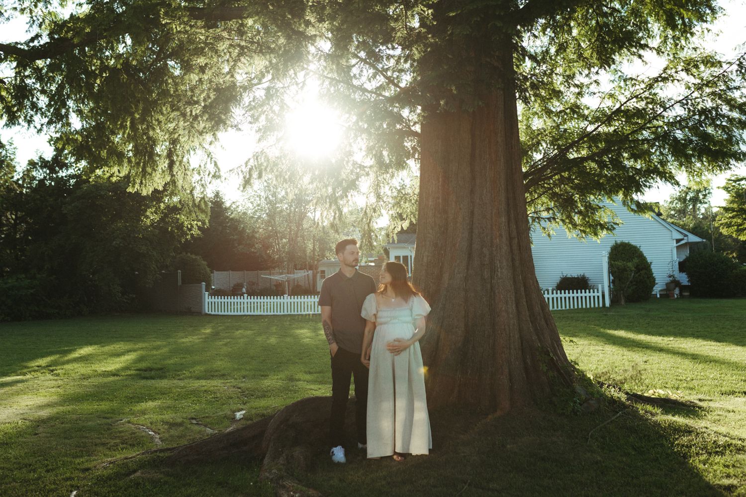 Parents to be in their front yard in Babylon, Long Island.
