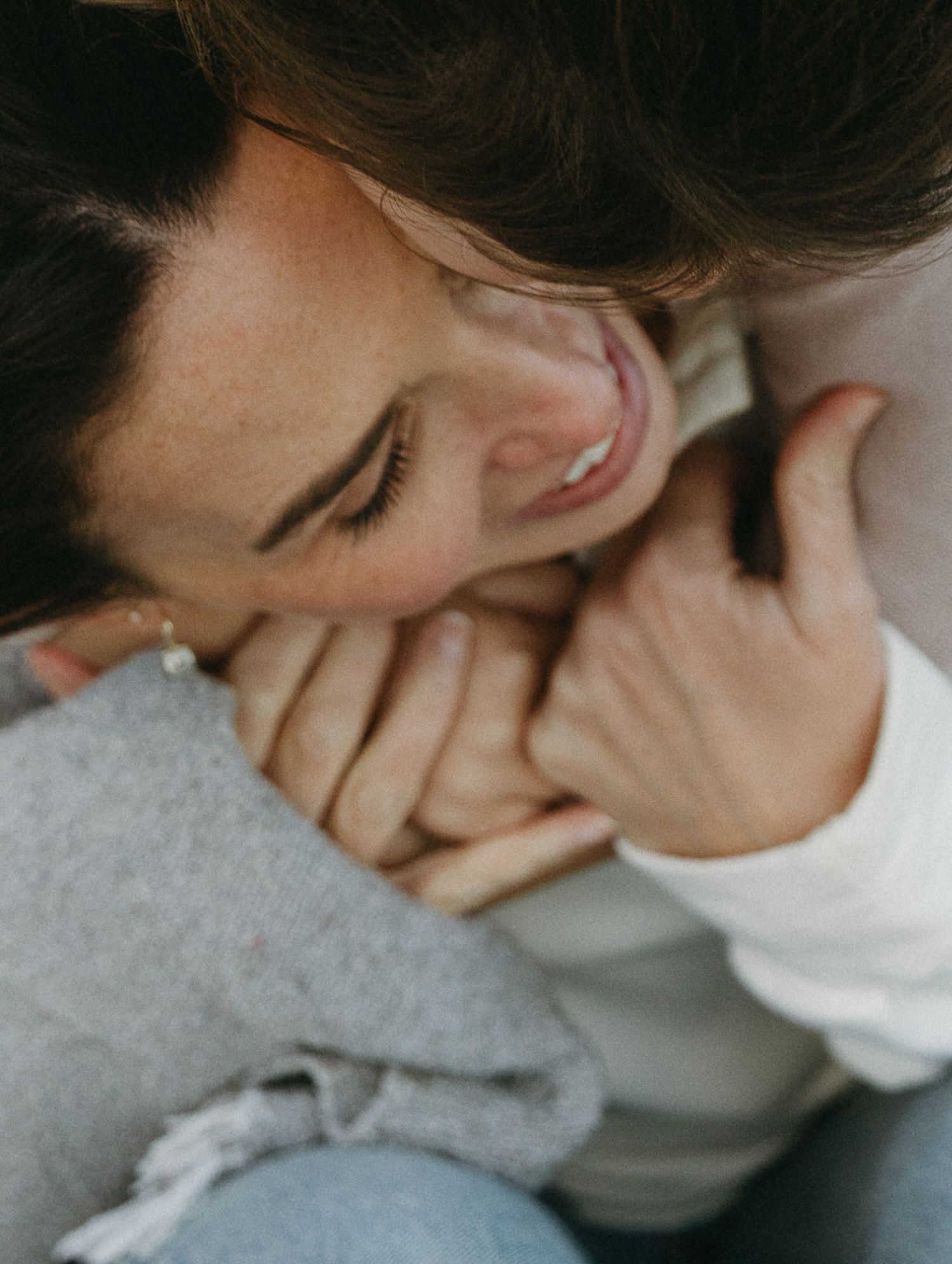 Close-up artistic photo series showing intimate moments in muted tones.