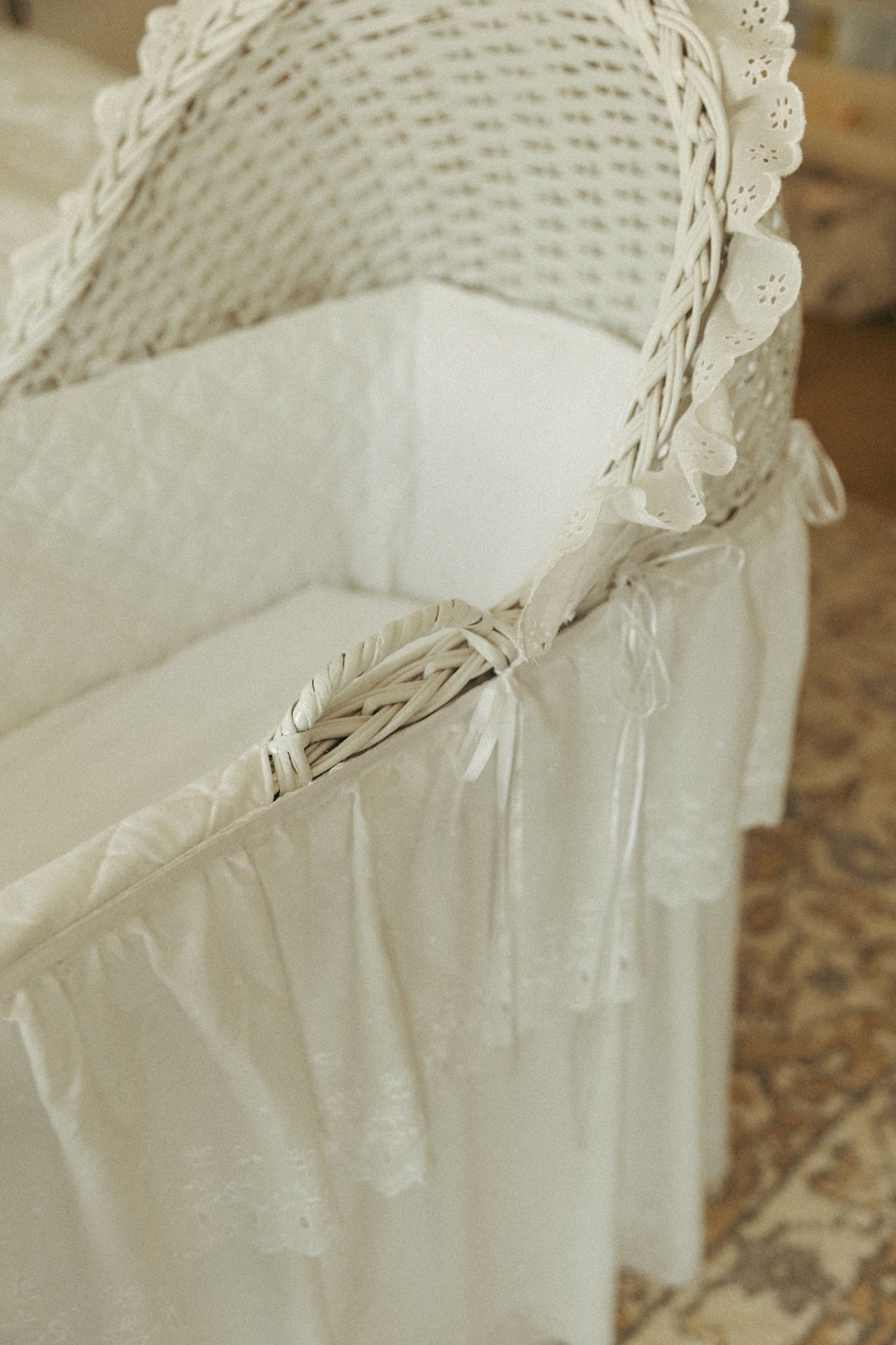 Delicate white lace trim detail on vintage-style fabric.