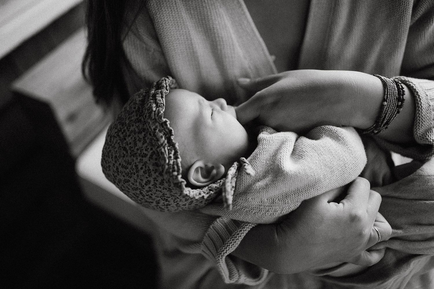 Intimate black and white photo series showing tender moments.