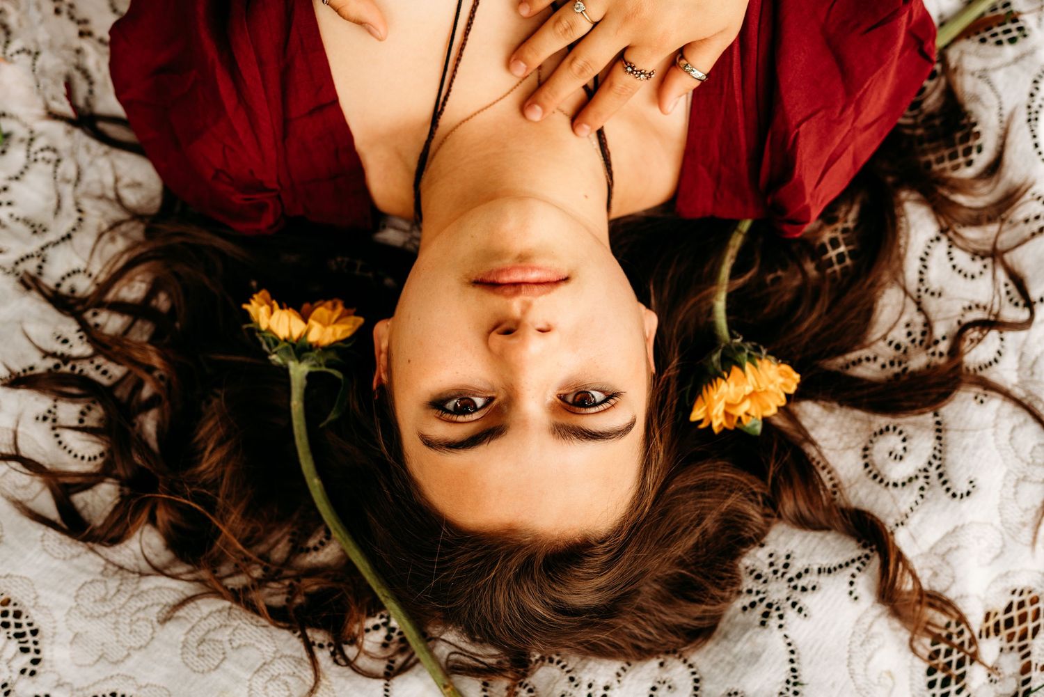 Creative senior girl portrait lying down with hair spread out