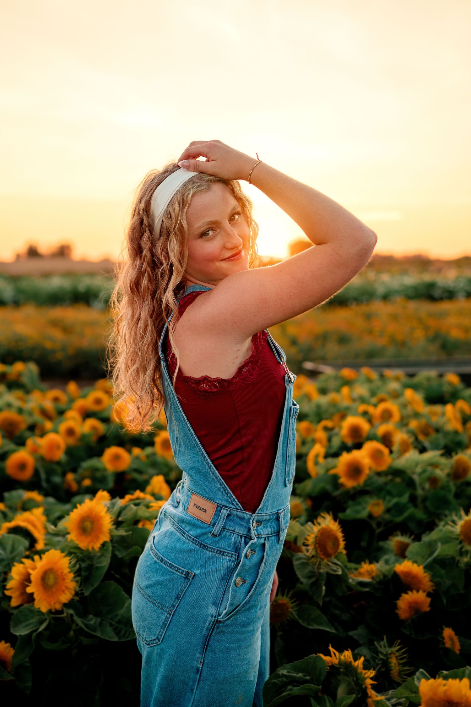 Senior portrait at golden hour at Wooden Shoe Tulip Farm in Oregon.