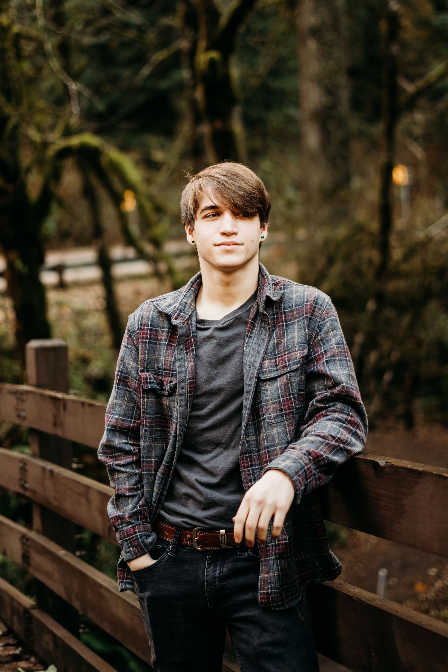 Senior boy standing on bridge