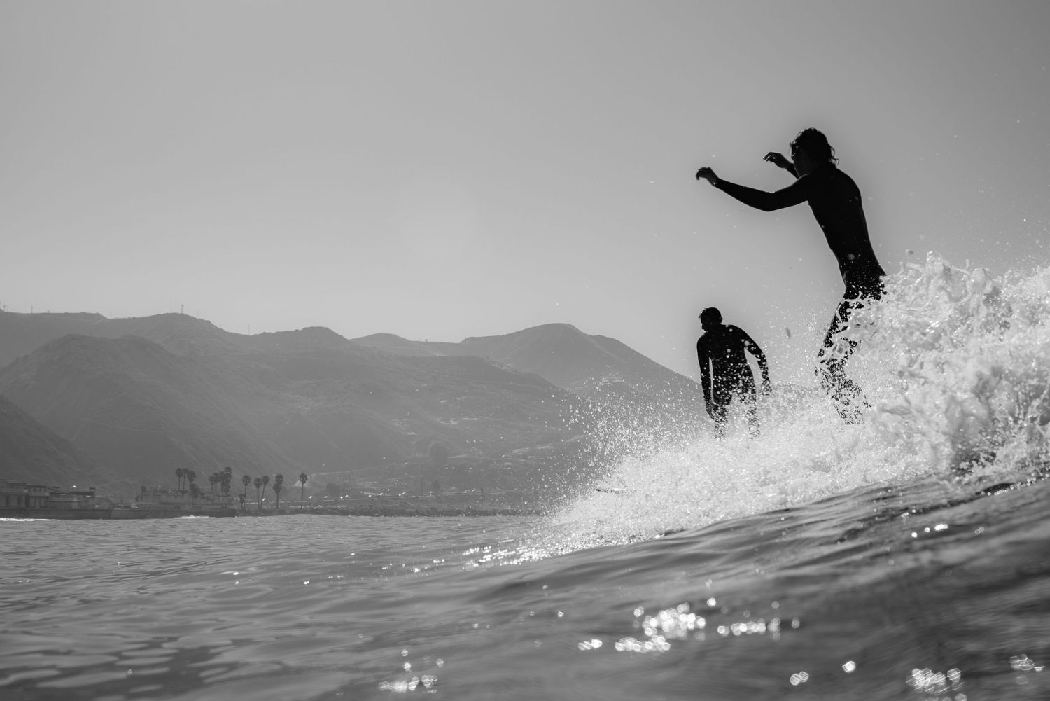 surfers at Mondos PCH