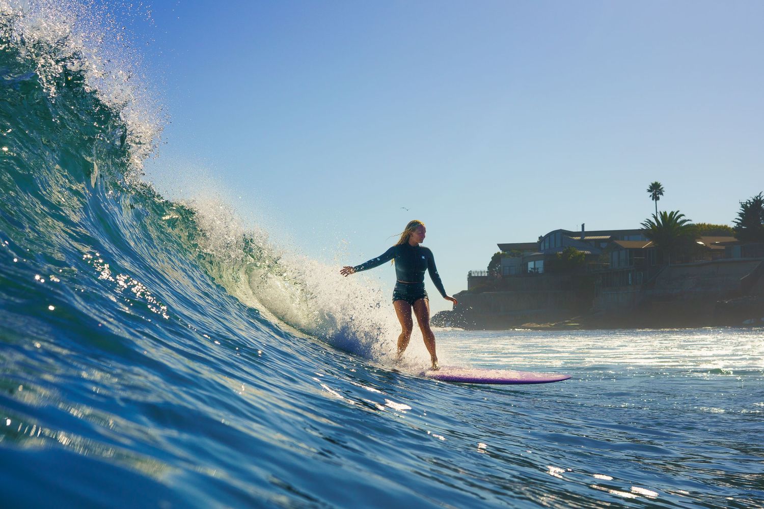 Female Surfer in Pleasure Point, Santa Cruz, CA