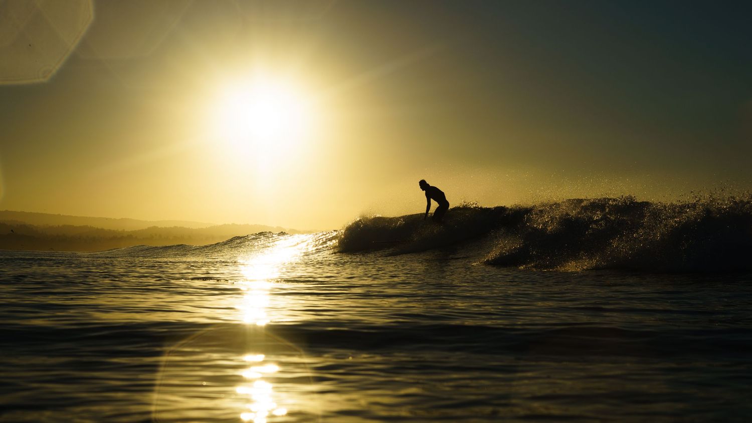 Photo of Santa Cruz Surfer at Sunrise