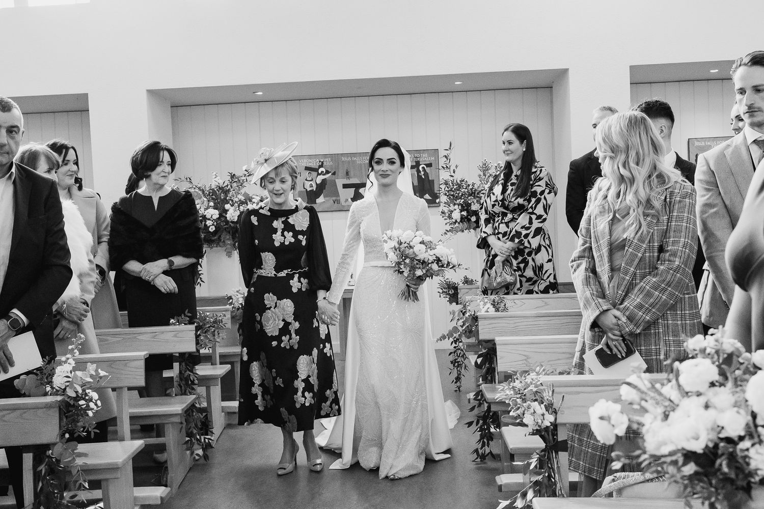 Dublin CIty wedding guests seated in rows during an indoor ceremony.