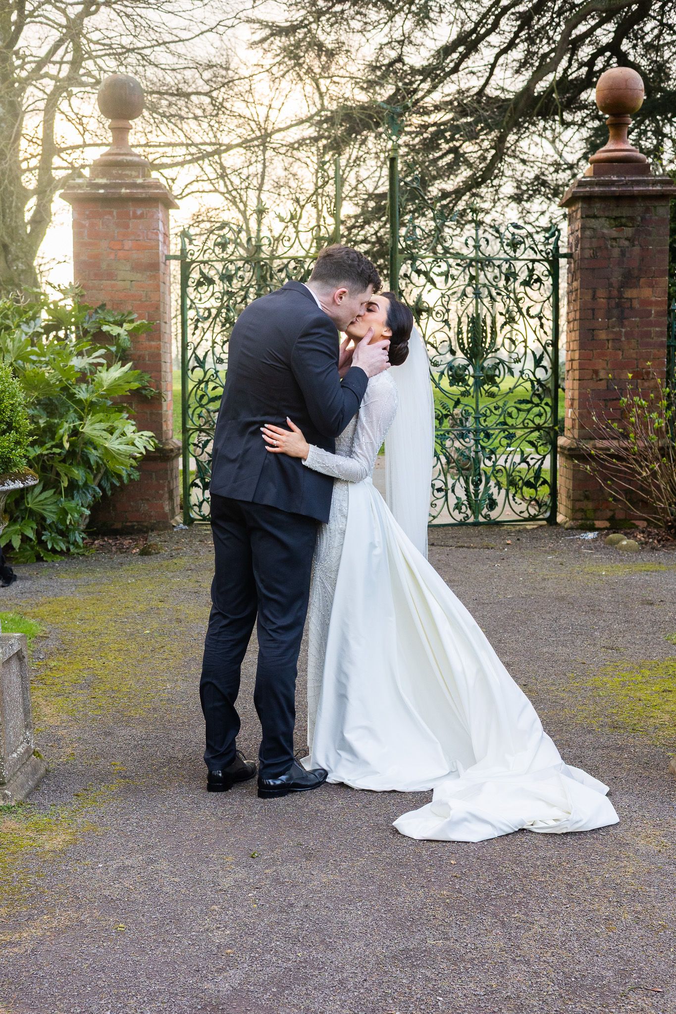Intimate wedding moments photographed by Dublin photographer in a garden setting at Tankardstown