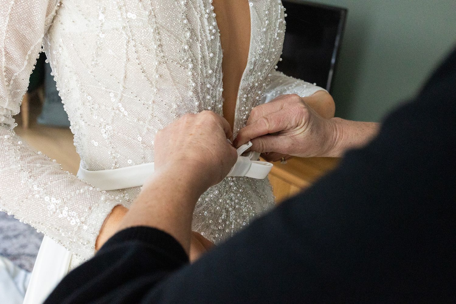 Close-up detail shot of a sparkly white wedding dress, photo by Dublin wedding photographer Laura