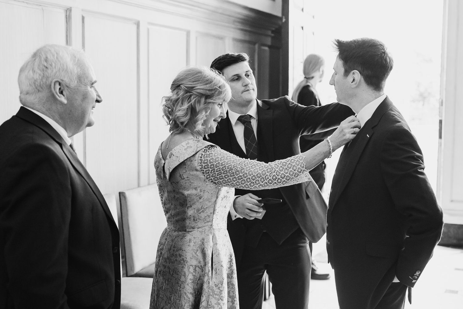 A black and white photo of people sharing a joyful moment at Dublin City wedding venue MoLI