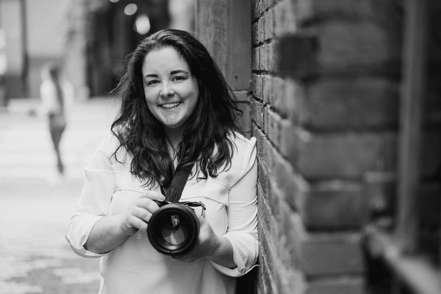 A series of candid photography shots showing a person with long dark hair smiling and laughing.