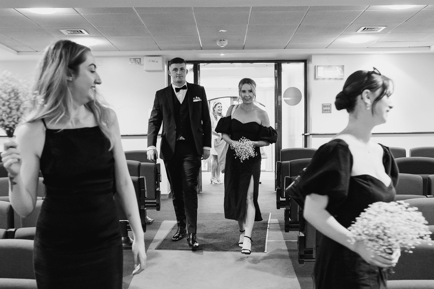 Wedding guests preparing for the ceremony at Dublin Registry Office.
