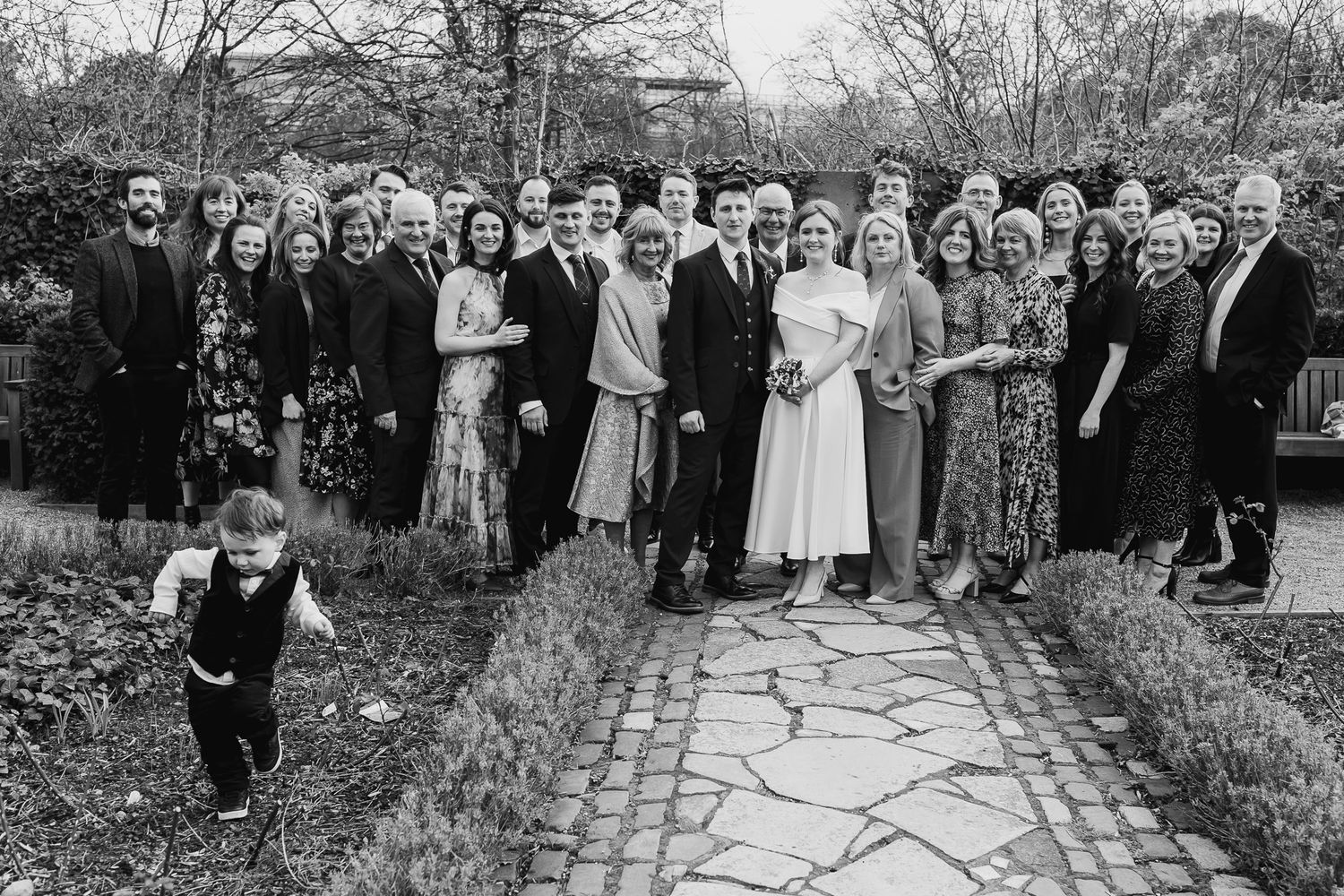 Large group wedding photo of guests gathered outside Dublin wedding venue MoLI