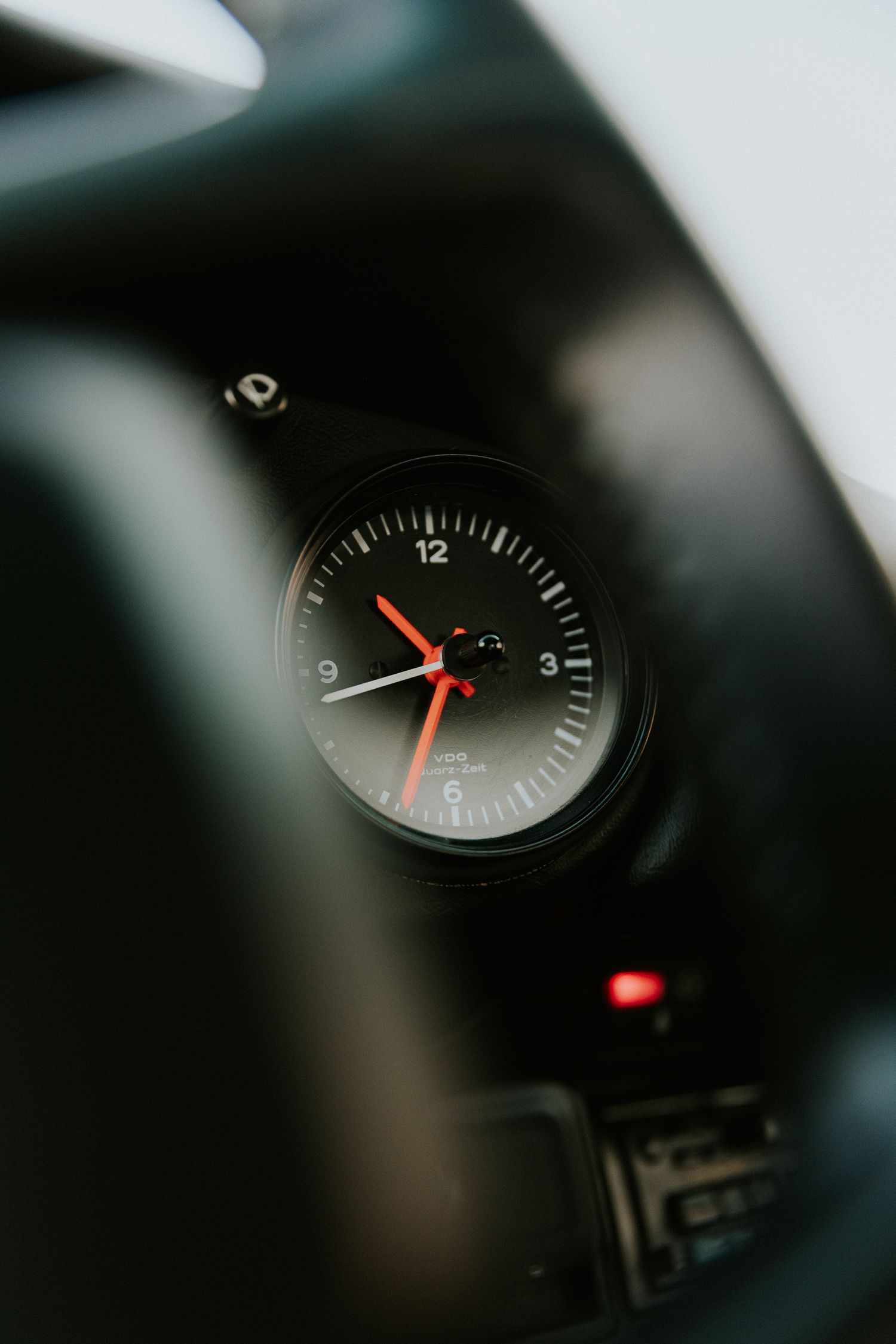 analog clock inside a classic porsche 911, shot by Dylan Spangler