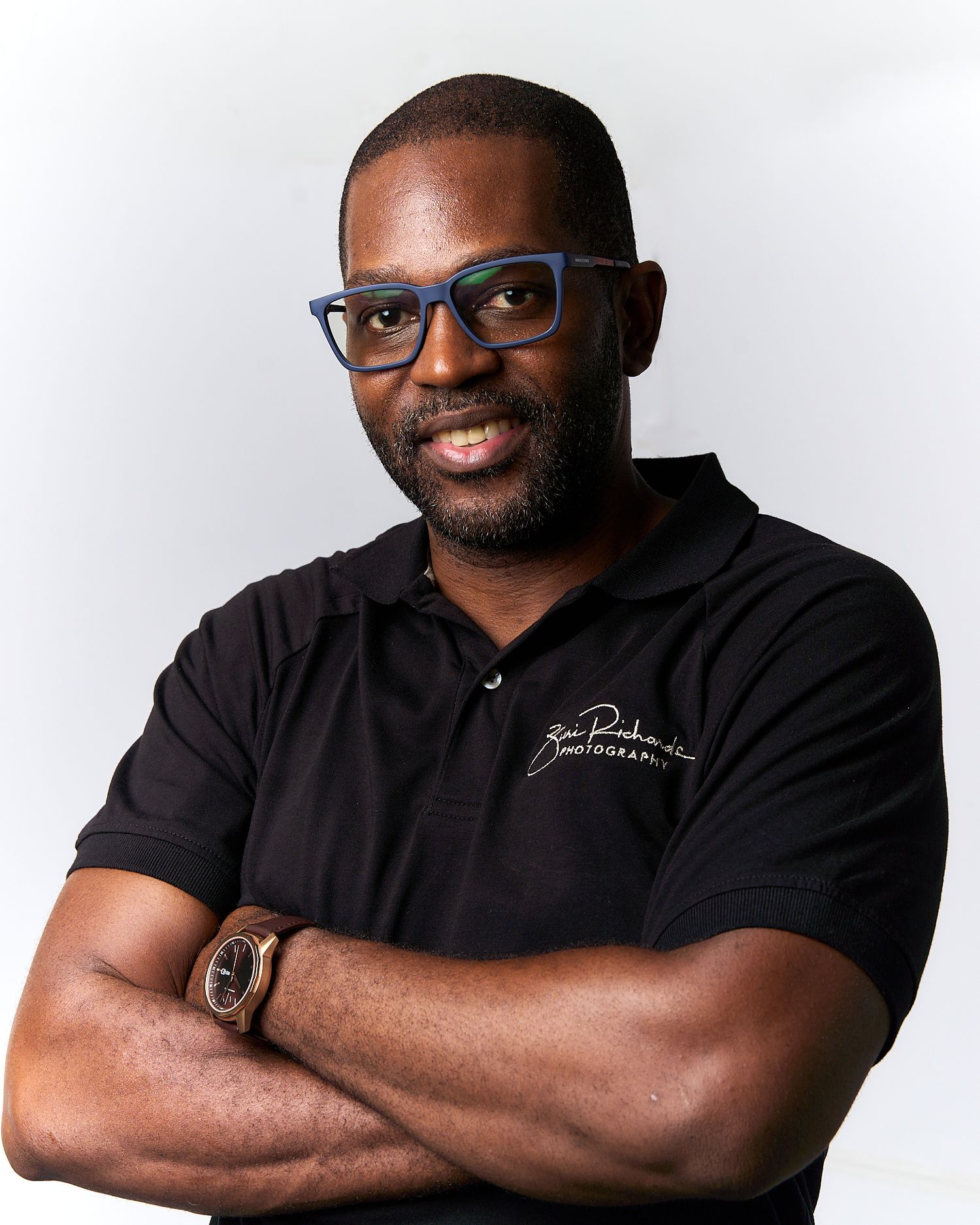 Professional headshots of person in black polo shirt with glasses against white background showing different poses.