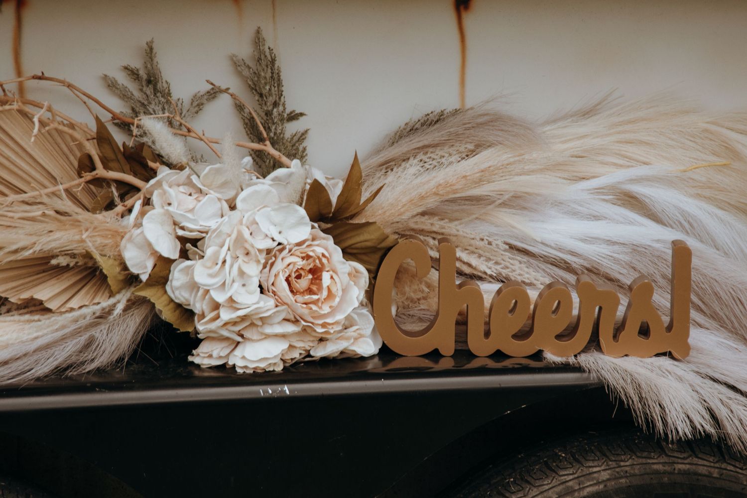 Wedding details styled in soft, earthy tones — the little touches that complete the day.