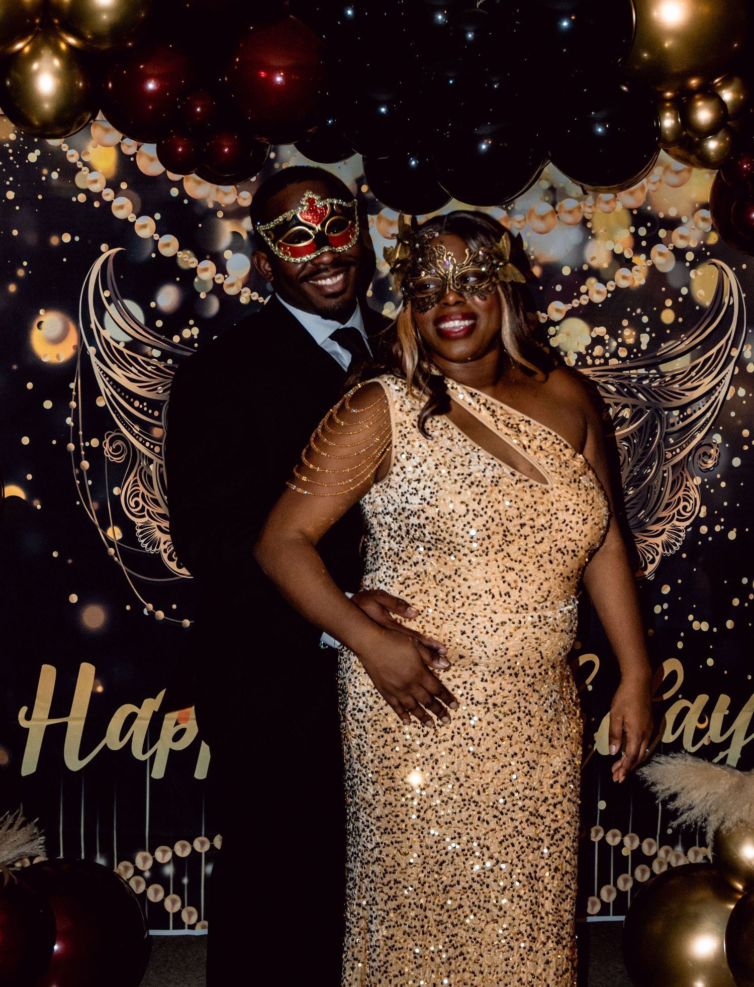 Masquerade party guests in sparkling gold dresses dance and celebrate under glittering lights and decorations.