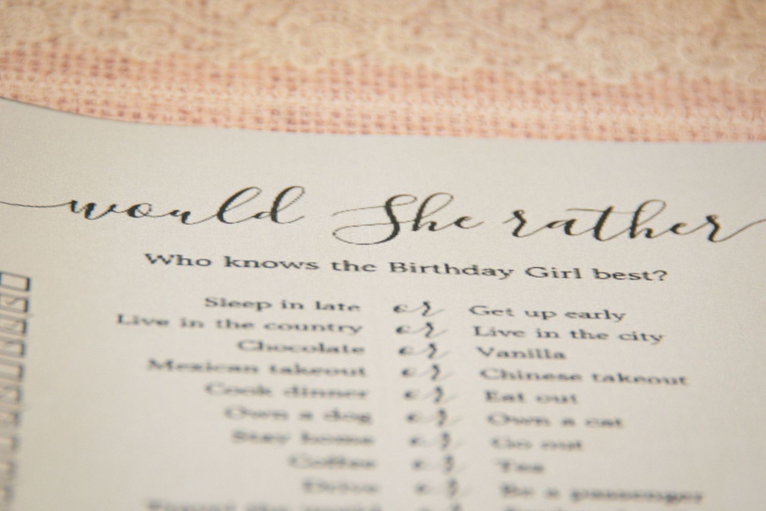 A close-up of elegant calligraphy text on a vintage paper document.