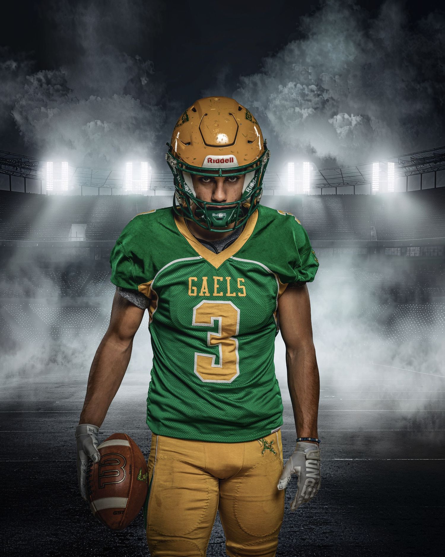 Football player in green Eagles jersey number 3 poses with ball in stadium with dramatic smoke and lighting effects.