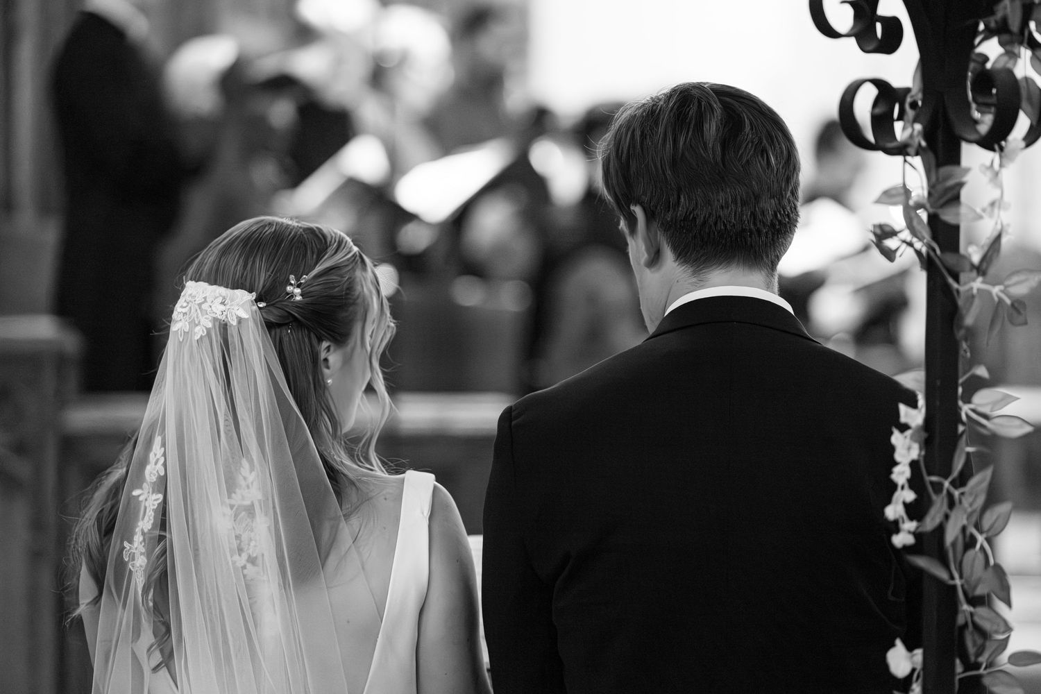 A romantic black and white wedding montage showing intimate moments between couples during their special day.