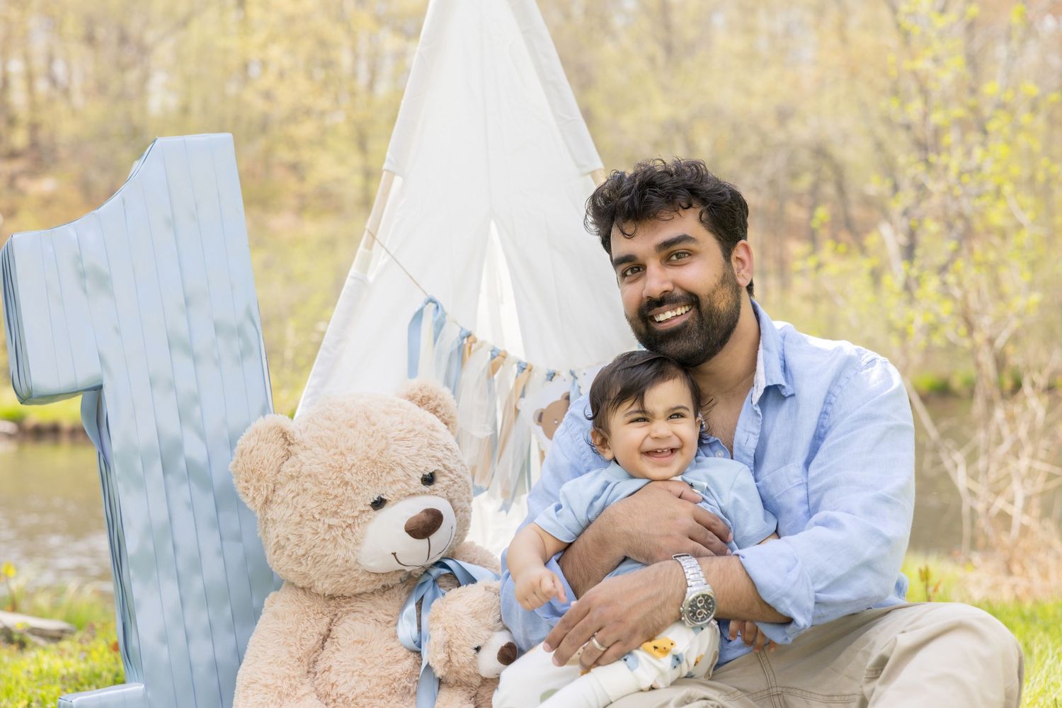 A series of four photos showing someone holding and playing with a teddy bear outdoors in a natural setting.