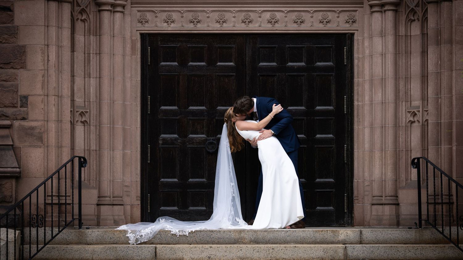 A panoramic wedding photo sequence showing a couple lounging on stone steps in front of a historic building entrance.