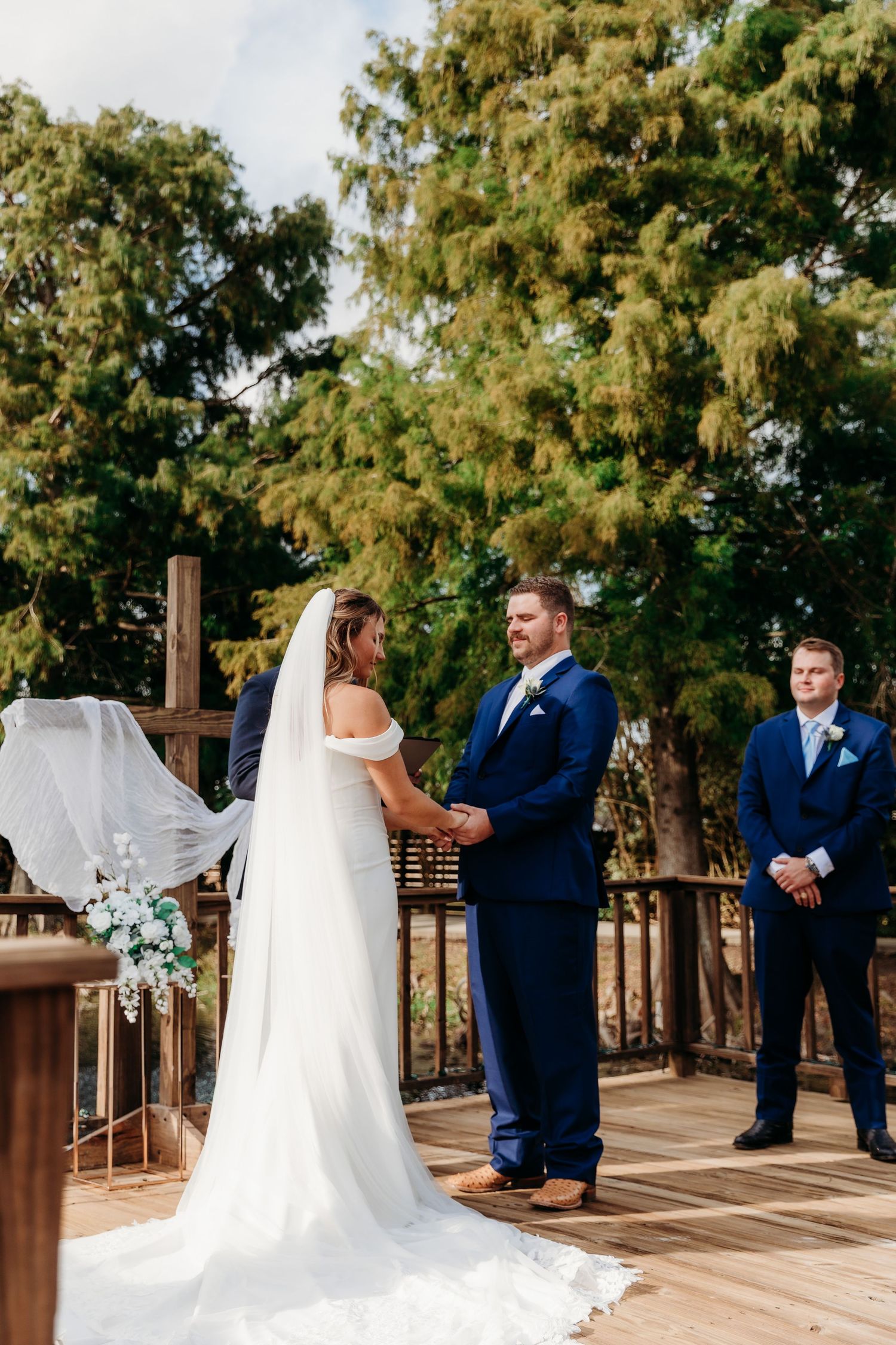 Outdoor wedding ceremony photographed by Magnolia TX wedding photographer