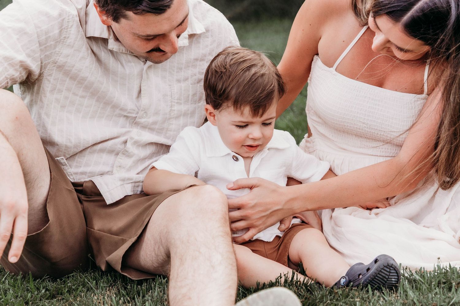 Parents and children laughing during family photoshoot in Magnolia Texas