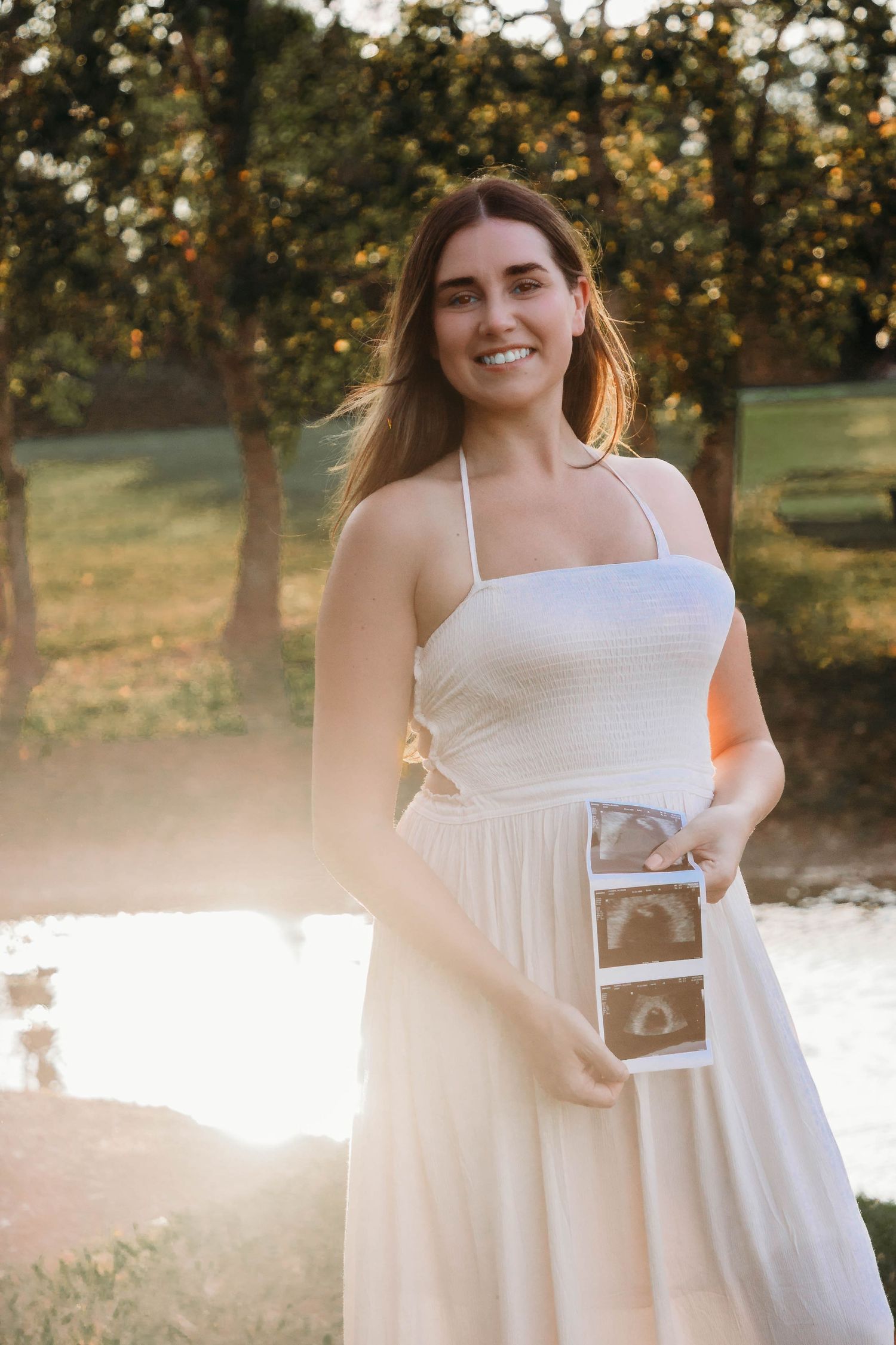 Pregnancy announcement photoshoot captured in natural light by Magnolia Events & Photography