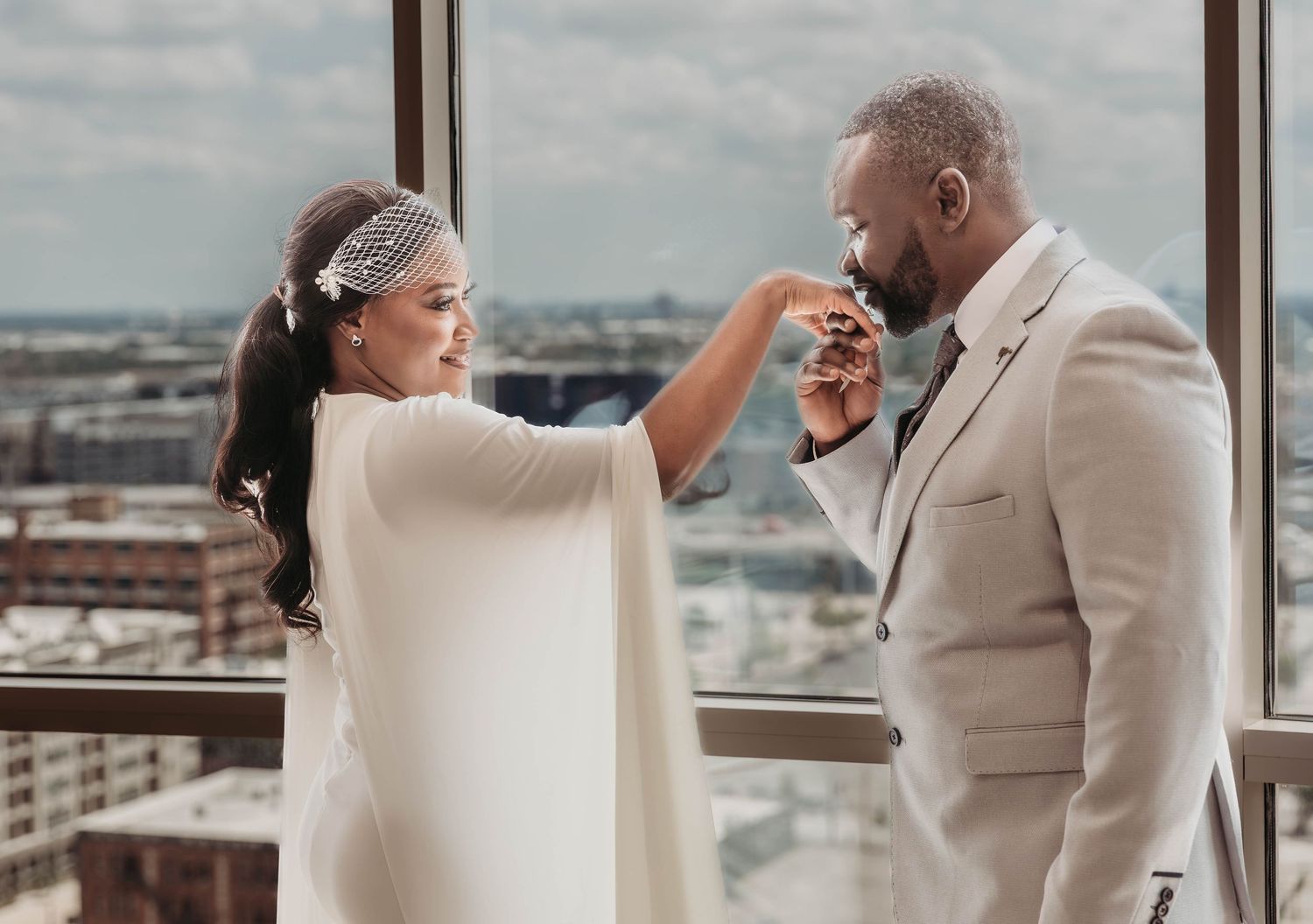 Bride and groom sharing a joyful moment during wedding day photographed by Magnolia TX wedding photographer