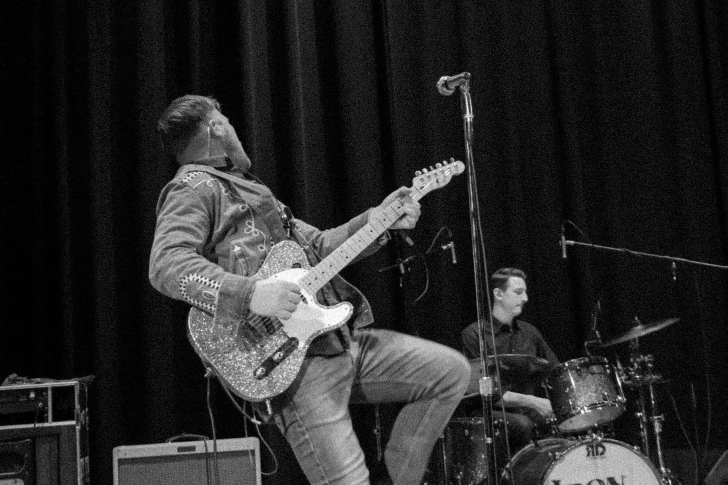 Lead singer of Iron Horse plays and moves around the stage