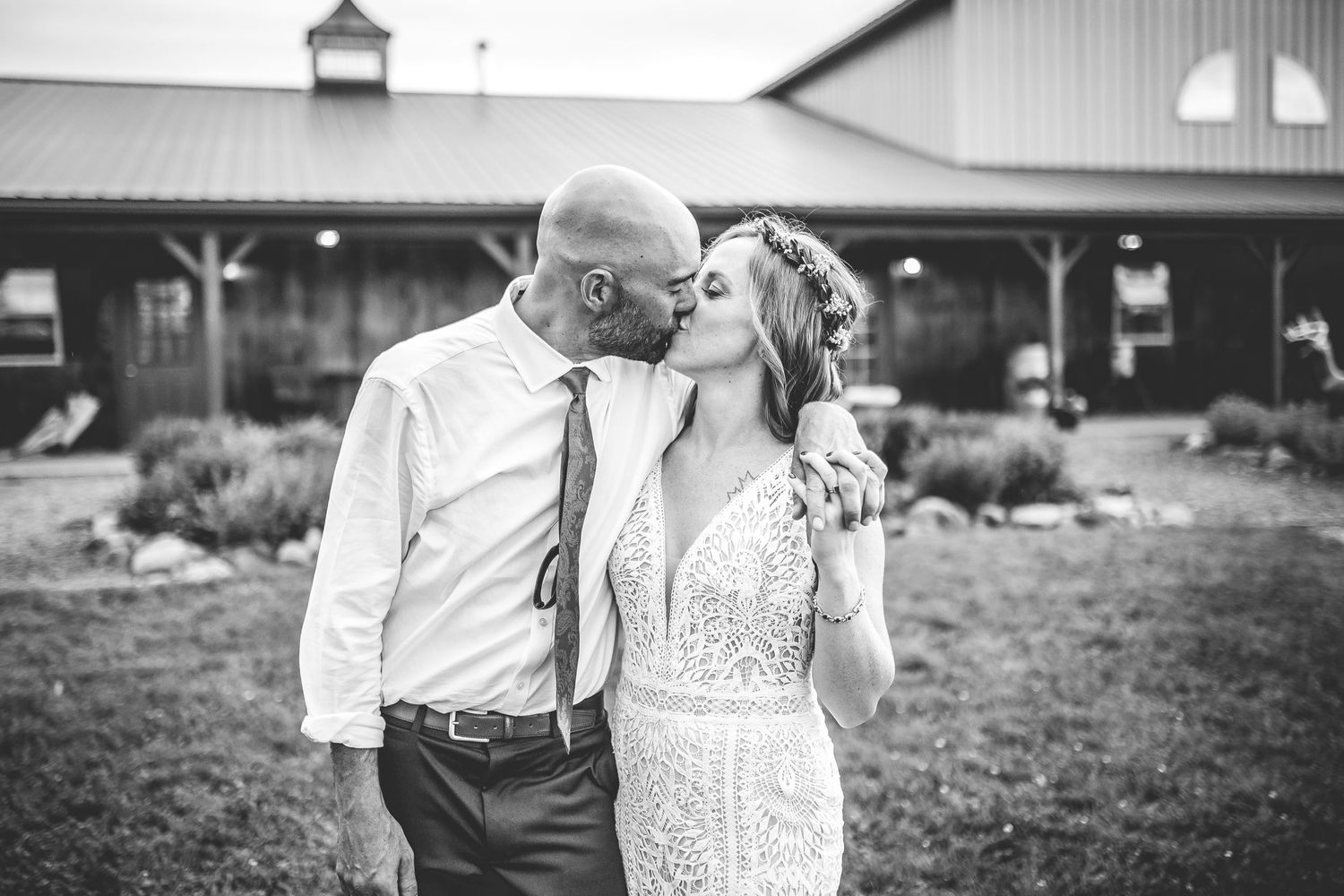 Romantic outdoor portraits at a rustic barn wedding venue.