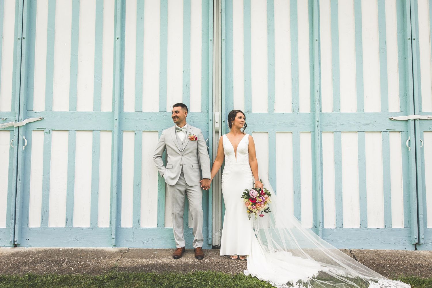 Wedding couple stands against blue wooden panels in an artistic photo collage.