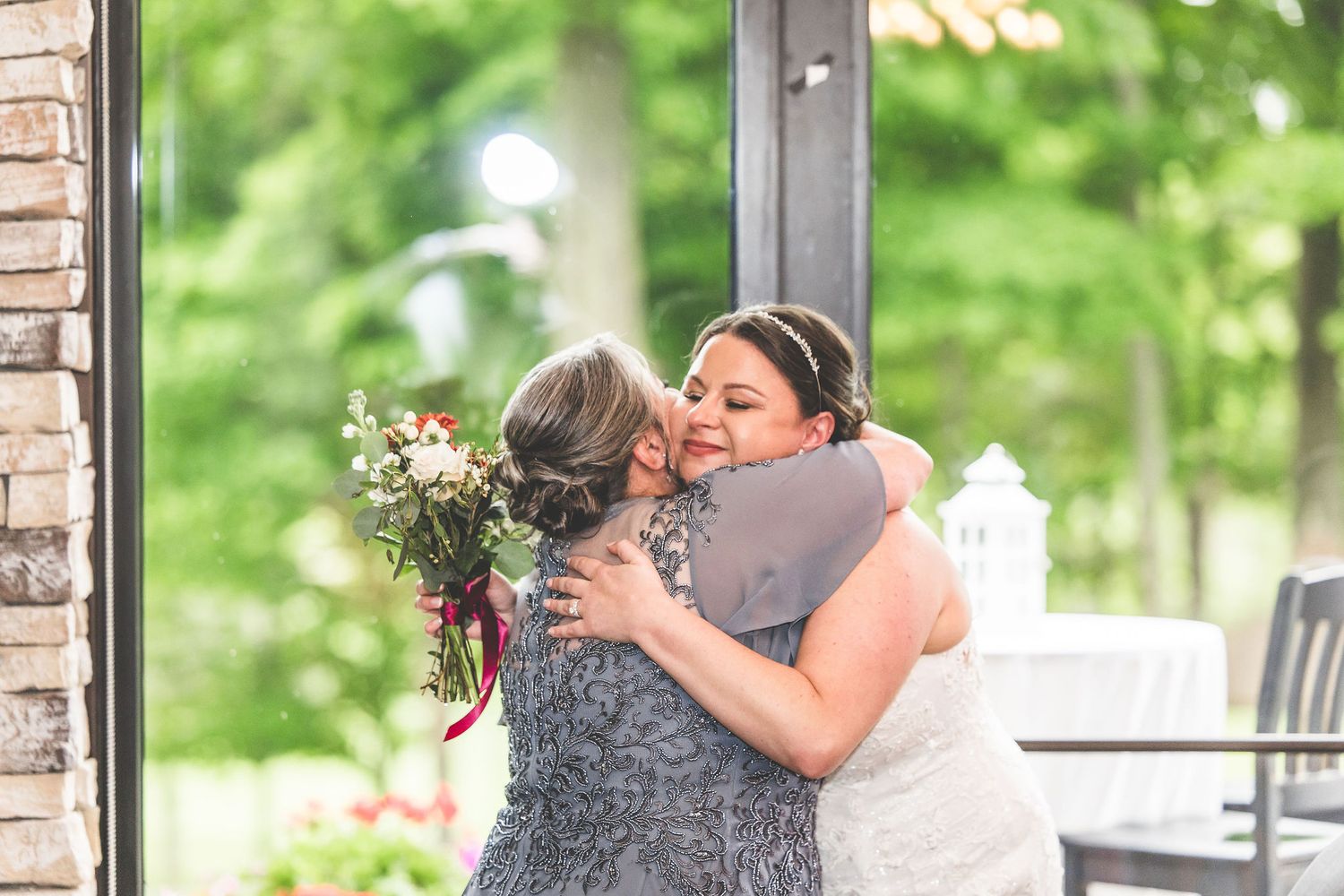 Joyful celebration moments captured during a wedding reception in a sunlit venue.