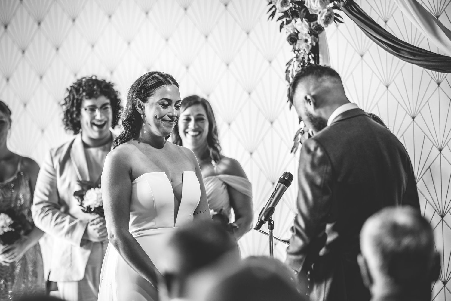 Wedding guests celebrate and dance together during a joyful reception.