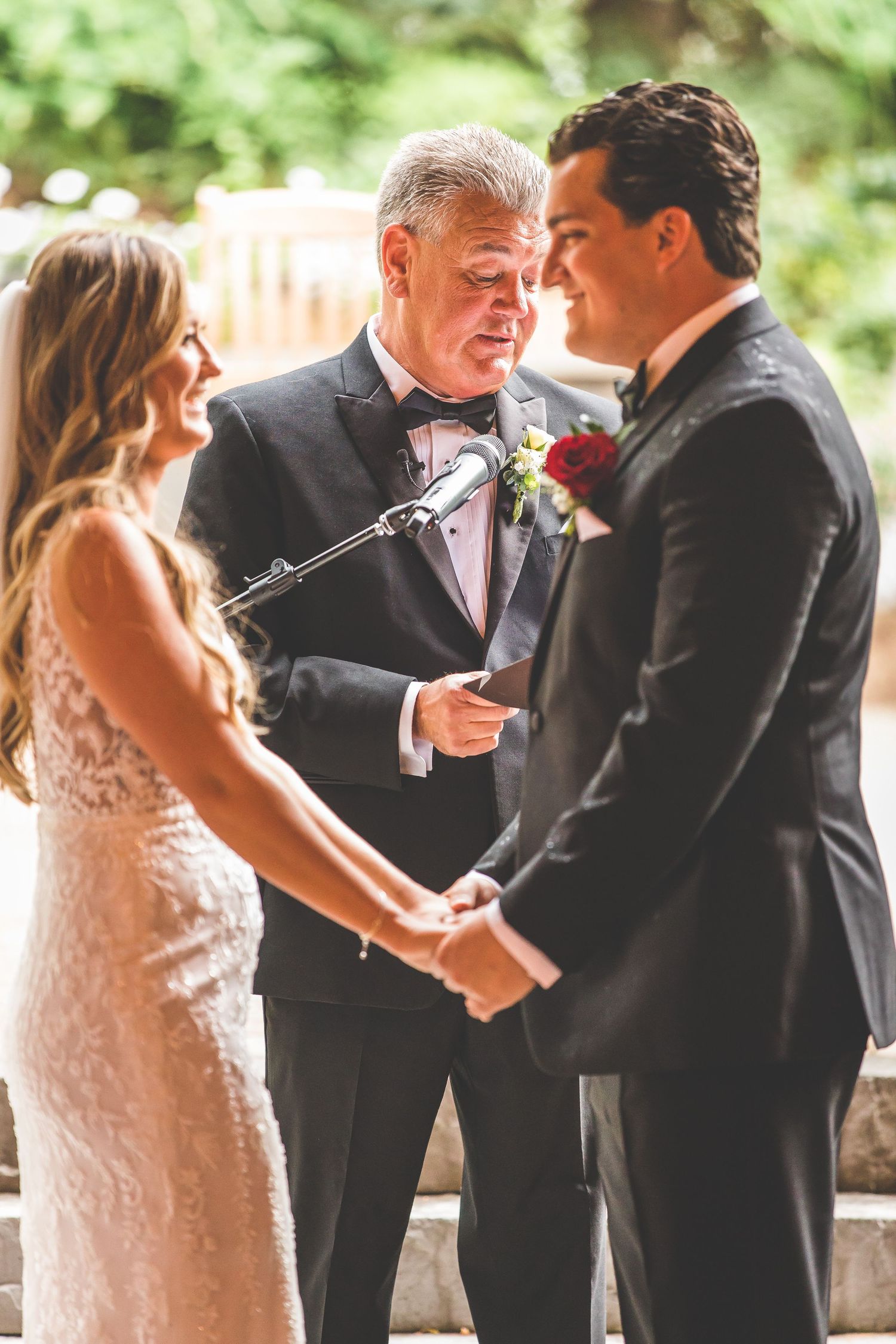 Wedding ceremony sequence showing exchange of vows in natural outdoor setting.