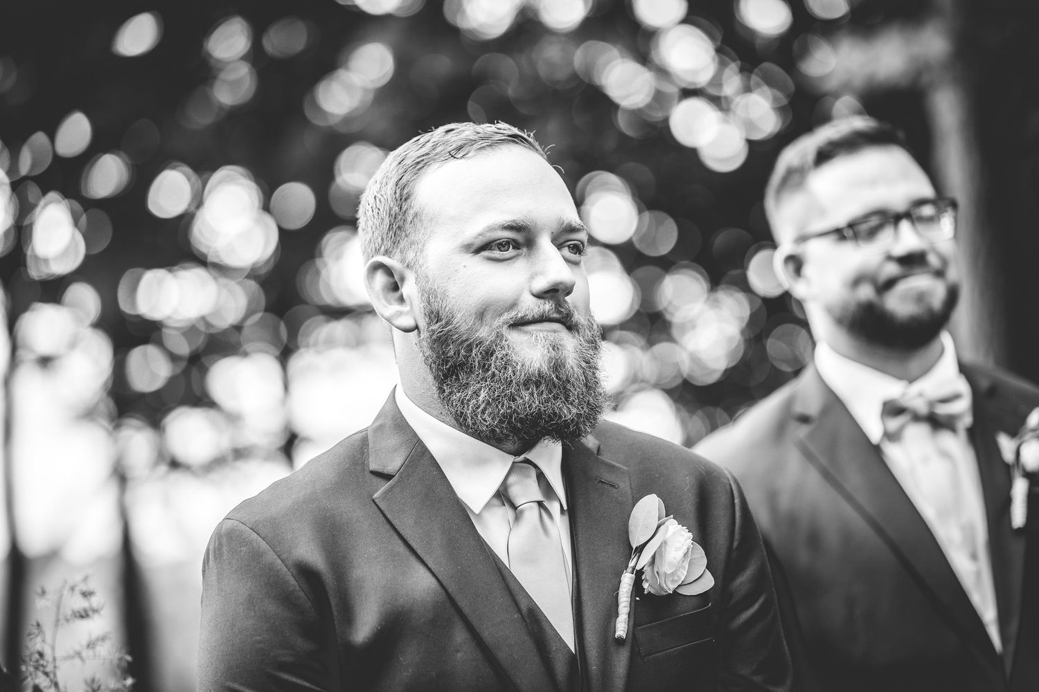Black and white photo of emotional wedding ceremony reactions.