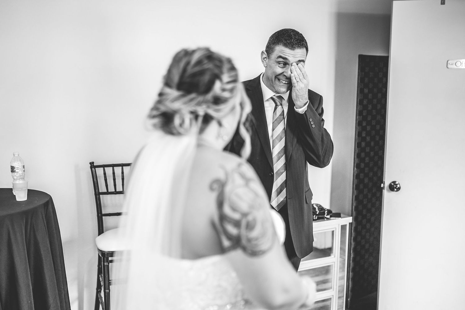Series of candid black and white emotional wedding moments.